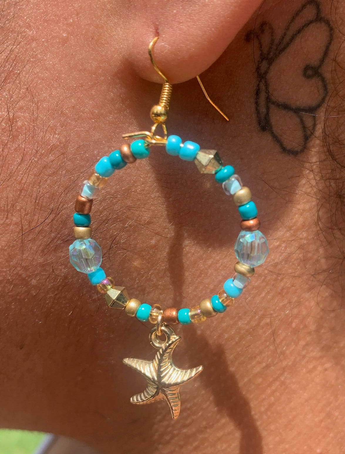 Gold Starfish Dangle Hoop Earrings