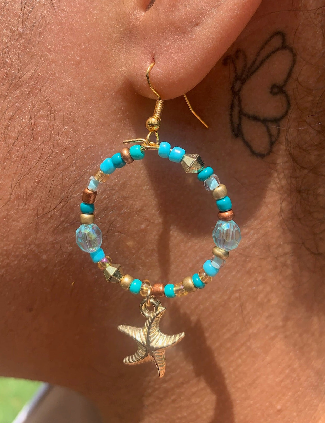Gold Starfish Dangle Hoop Earrings
