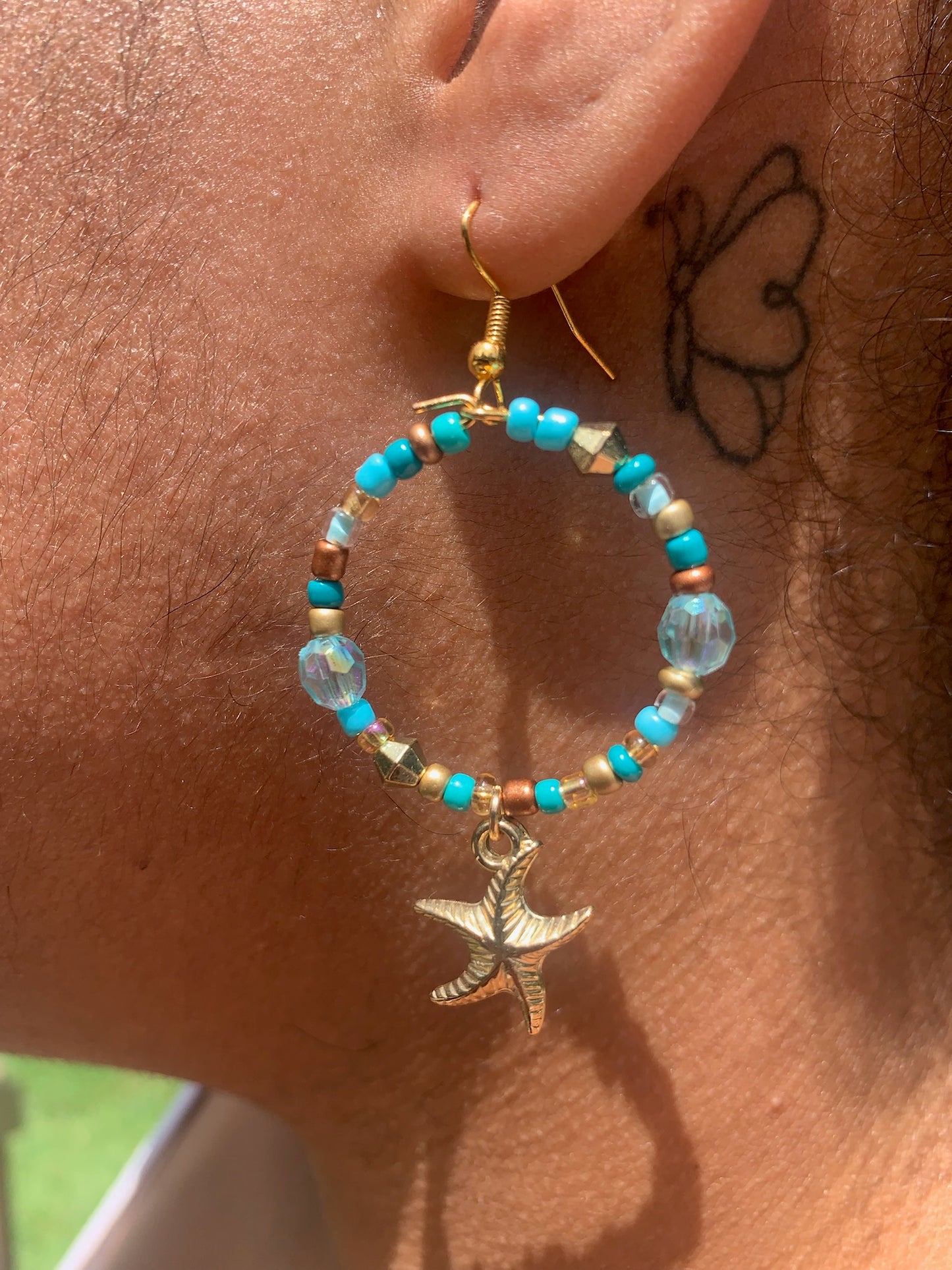 Gold Starfish Dangle Hoop Earrings