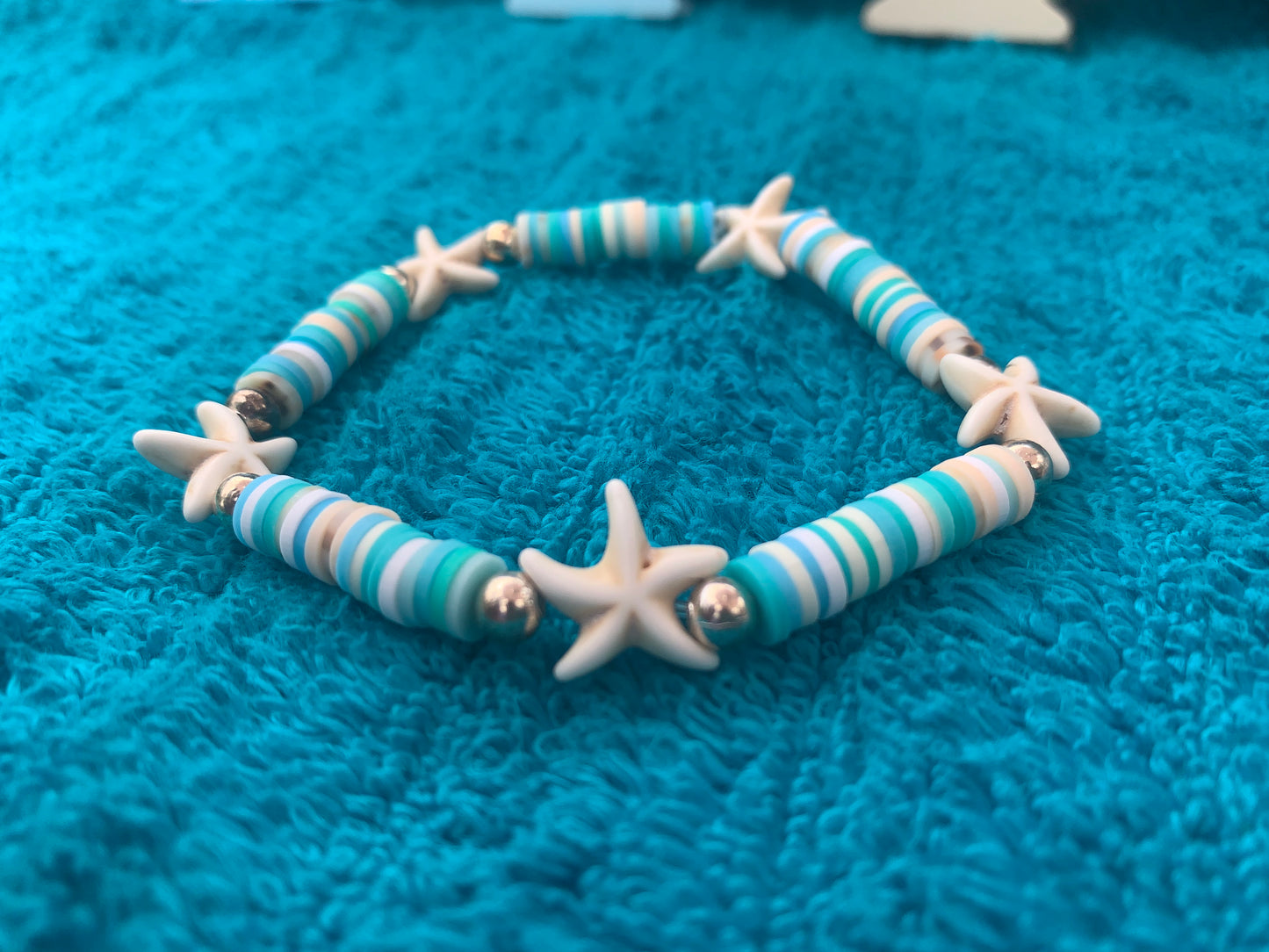 Multi-Starfish Spacer Heishi Bead Bracelet