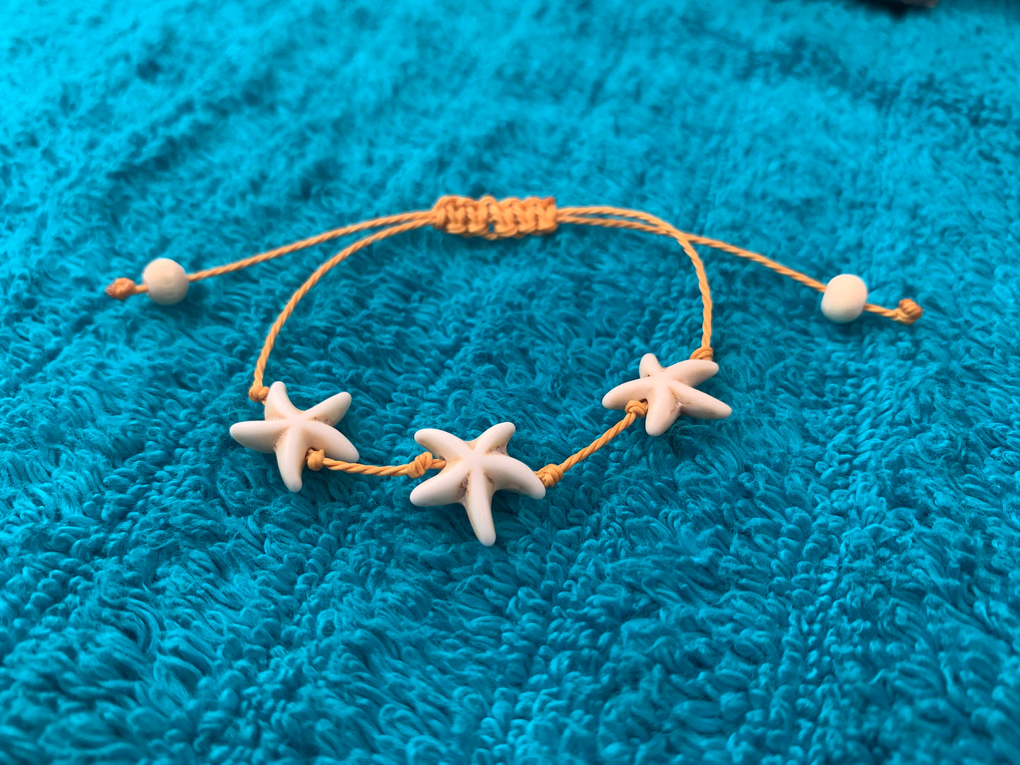 Single Strand Triple Starfish Wax Cord Bracelet