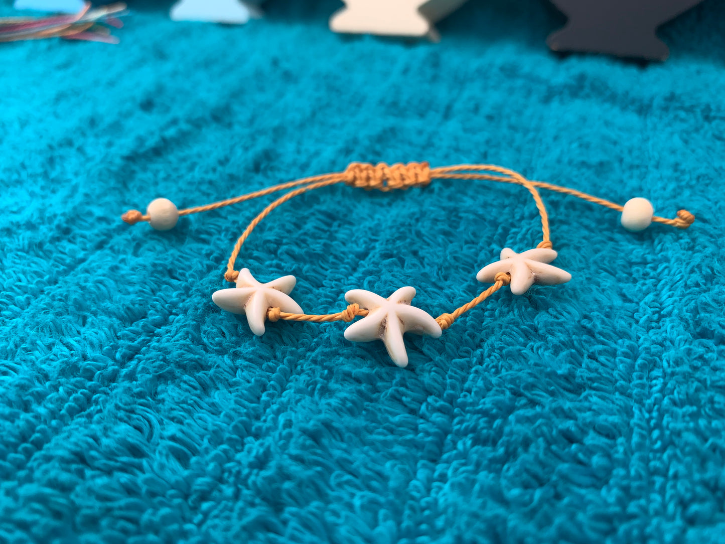 Single Strand Triple Starfish Wax Cord Bracelet