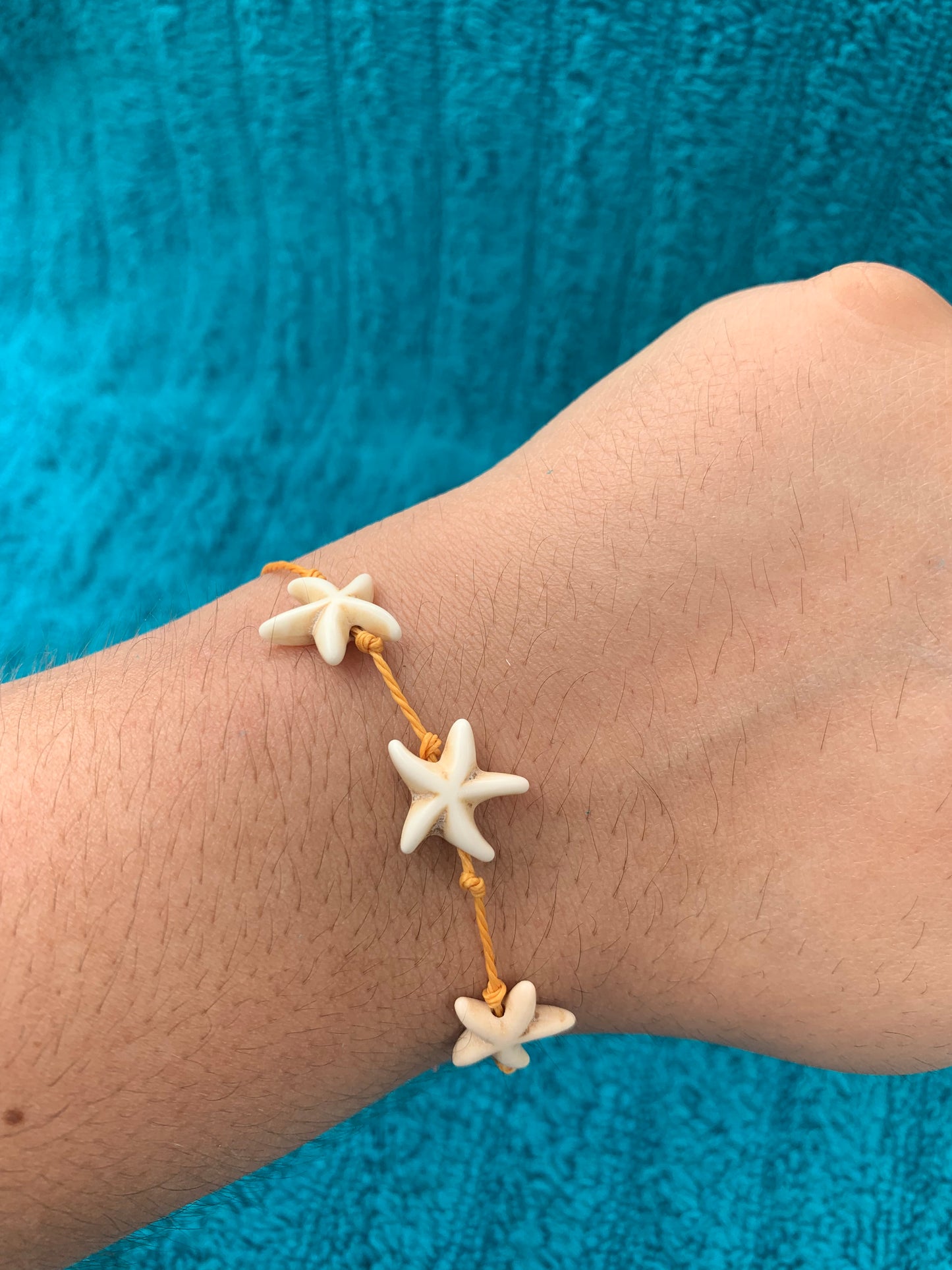 Single Strand Triple Starfish Wax Cord Bracelet