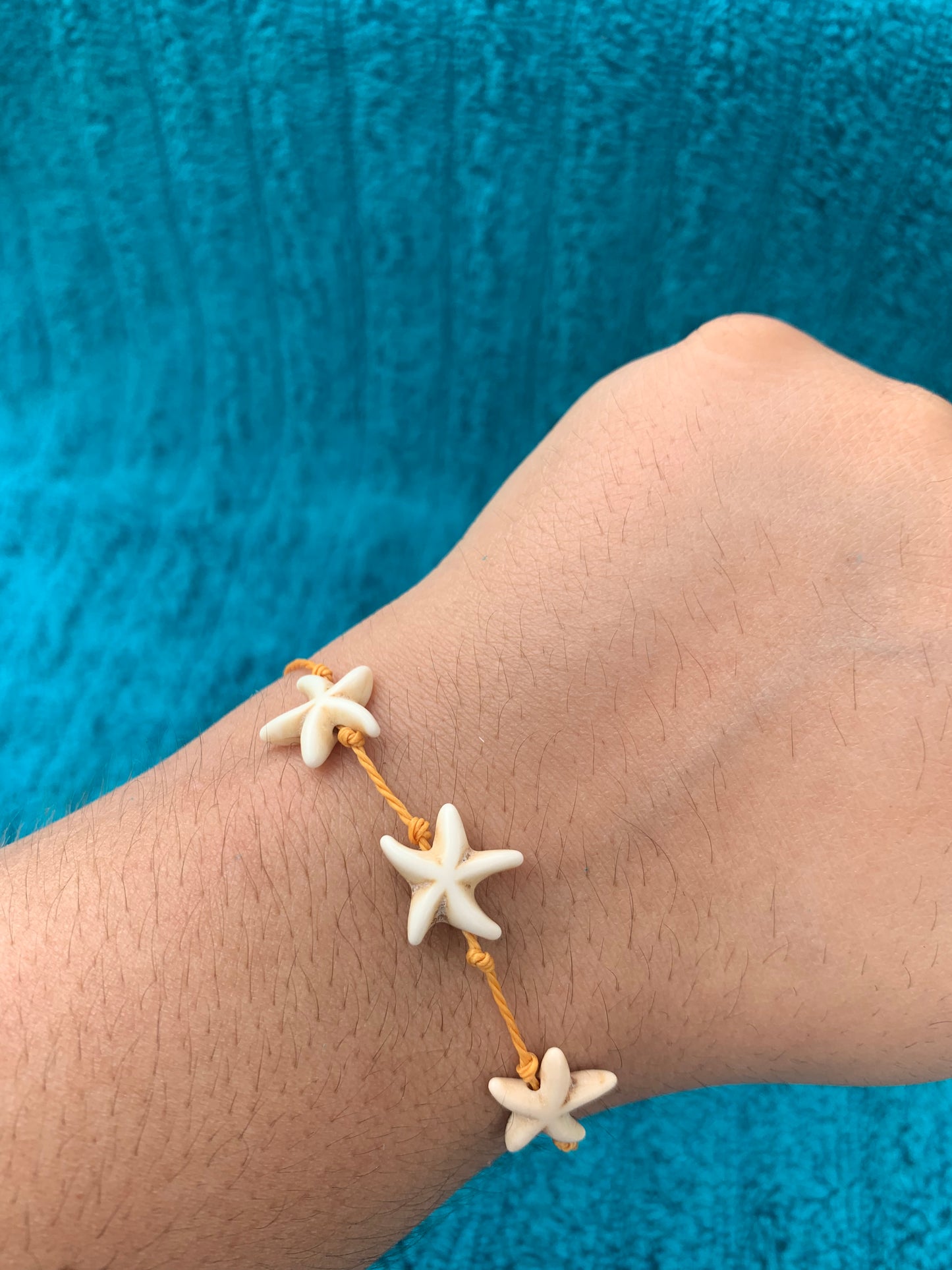 Single Strand Triple Starfish Wax Cord Bracelet